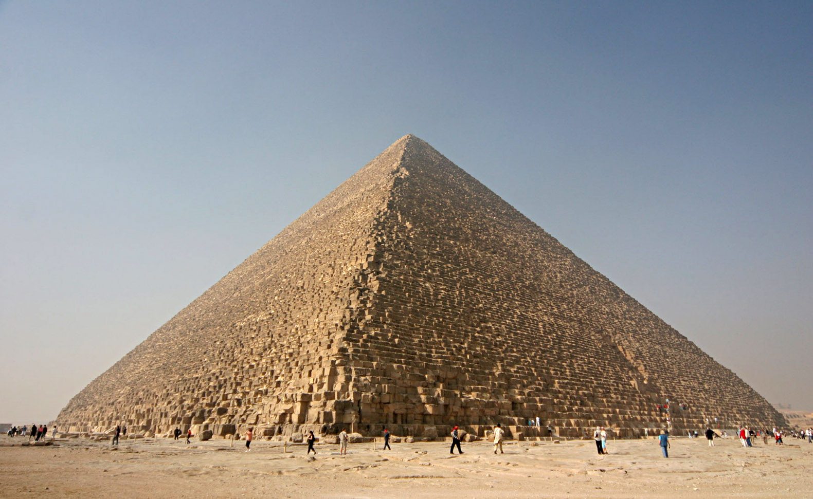 The Great Pyramid of Khufu at Giza against a clear sky.